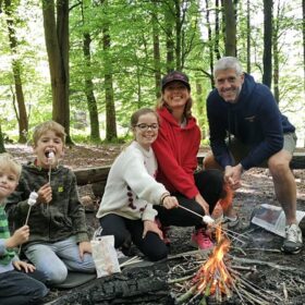 Toasting marshmallows on a fire
